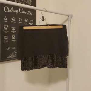 Black sequin and sheer mini skirt